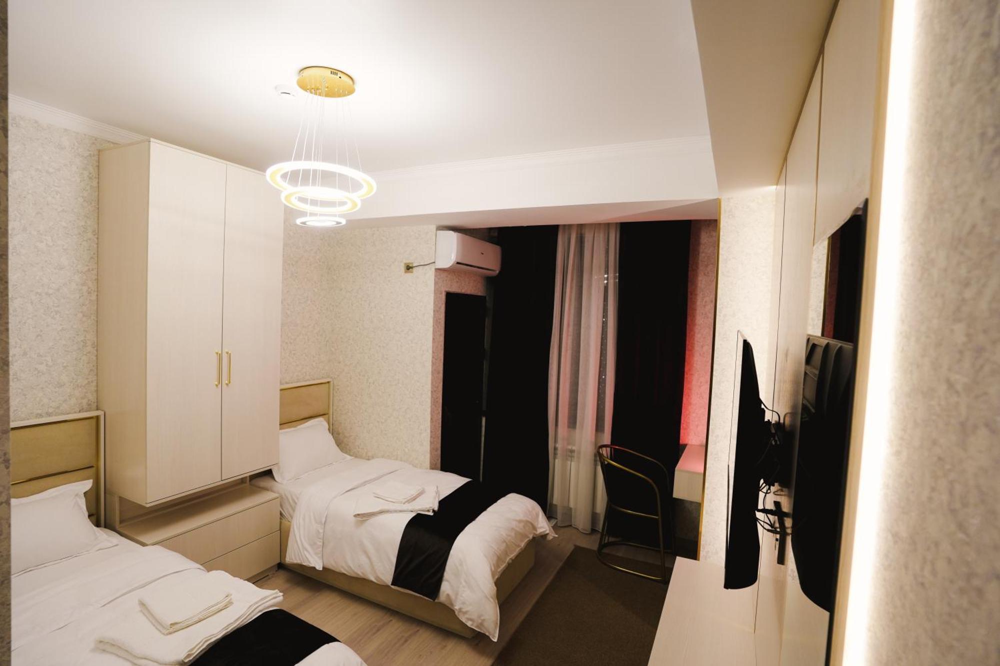 Baland Hotel ดูแชนเบอ ภายนอก รูปภาพ