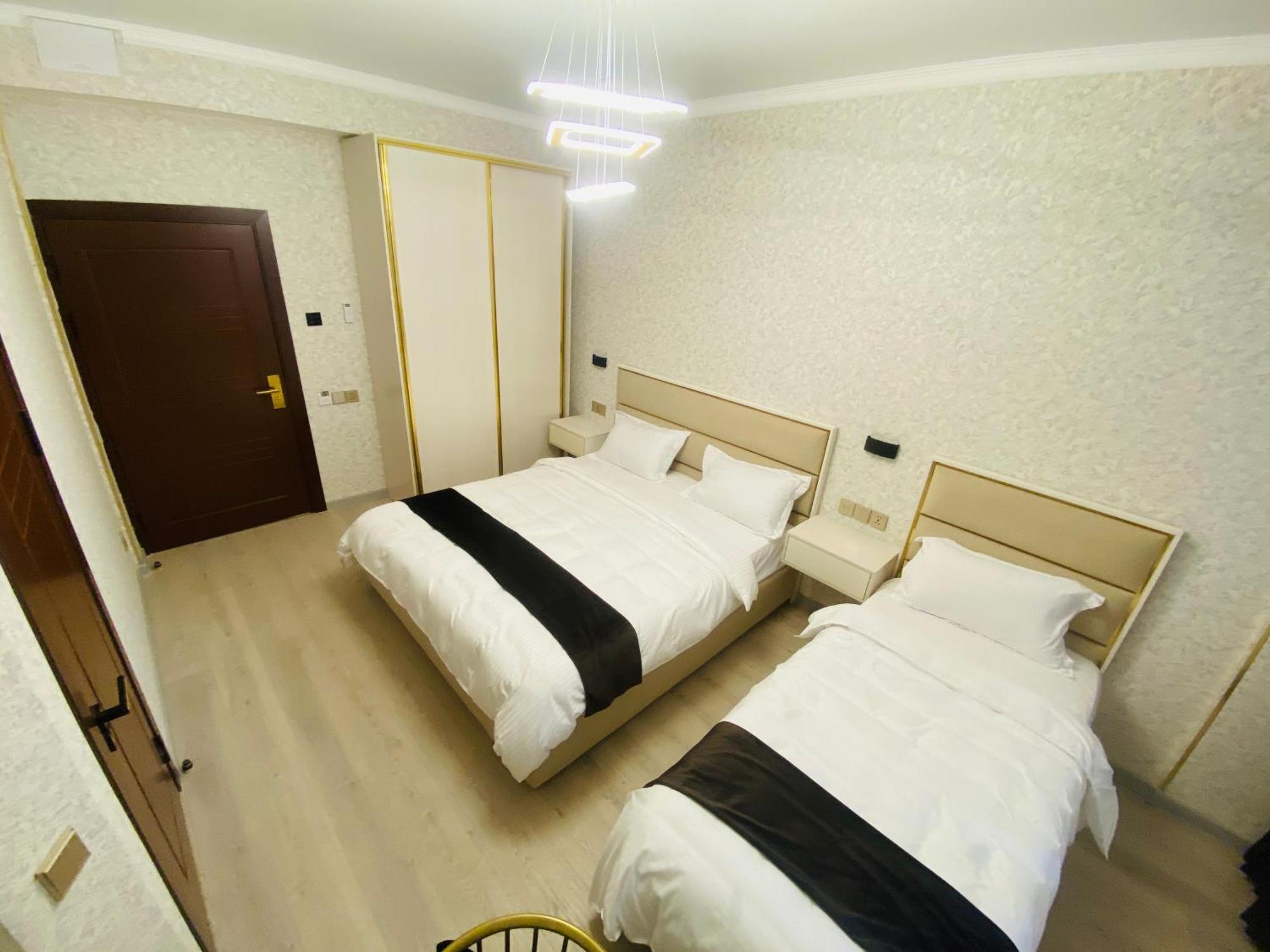 Baland Hotel ดูแชนเบอ ภายนอก รูปภาพ