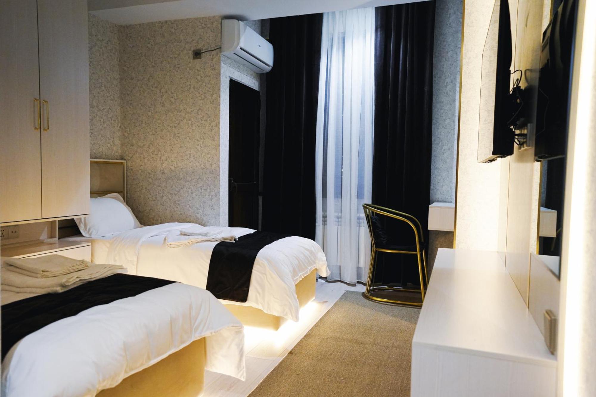 Baland Hotel ดูแชนเบอ ภายนอก รูปภาพ