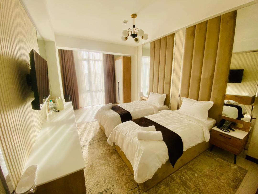 Baland Hotel ดูแชนเบอ ภายนอก รูปภาพ